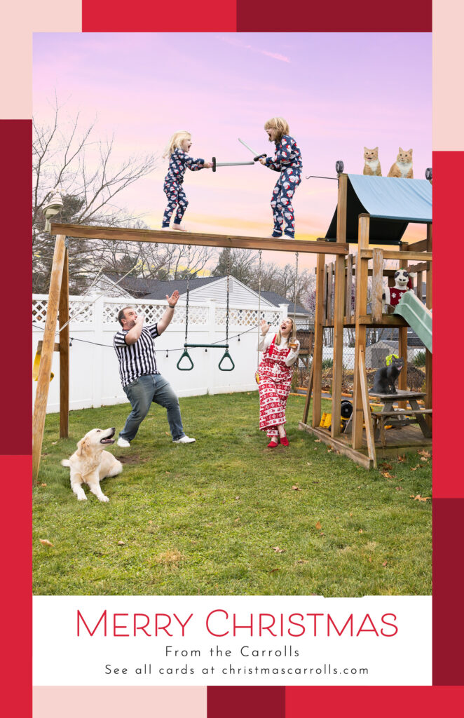 A Christmas card featuring the Carroll Family. It shows two children sword fighting on top of a swing set while the parents watch from the ground.