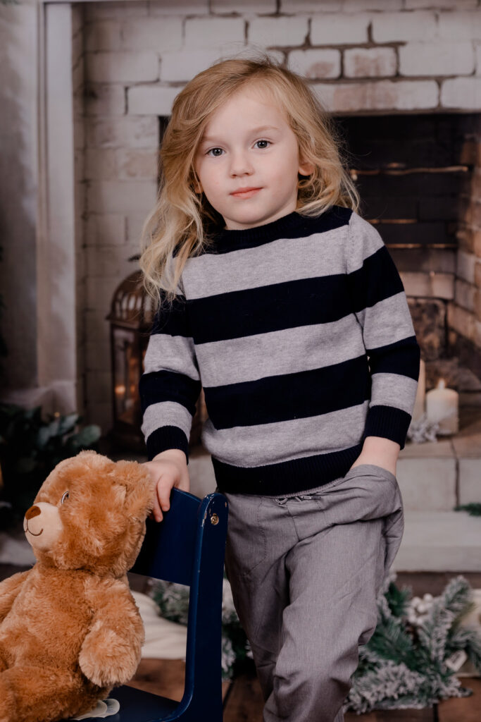 A young boy with a serious face.